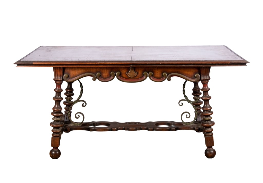 RENAISSANCE STYLE DINING TABLE: Renaissance style dining table with wrought iron strolling design, stretcher base, and turned legs. Approximate dimensions: h. 29", w. 65", d. 42" Disclaimer: Participating bidders must have a credit
