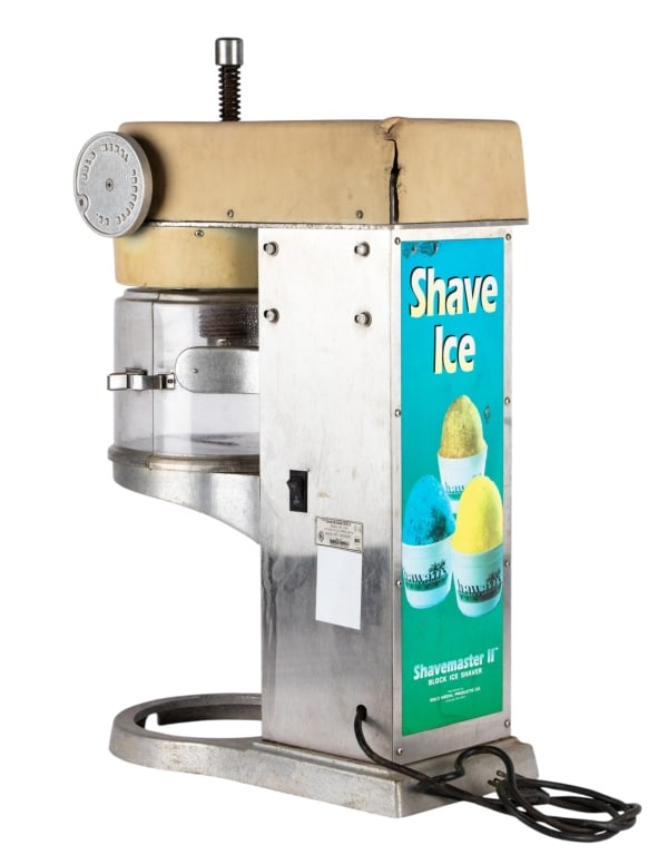 SHAVEMASTER II COMMERCIAL ICE SHAVER: Shavemaster II commercial ice shaver. Approximate dimensions: h. 31.5", w. 10", d. 19" Disclaimer: Participating bidders must have a credit card on file with LiveAuctioneers in order for their