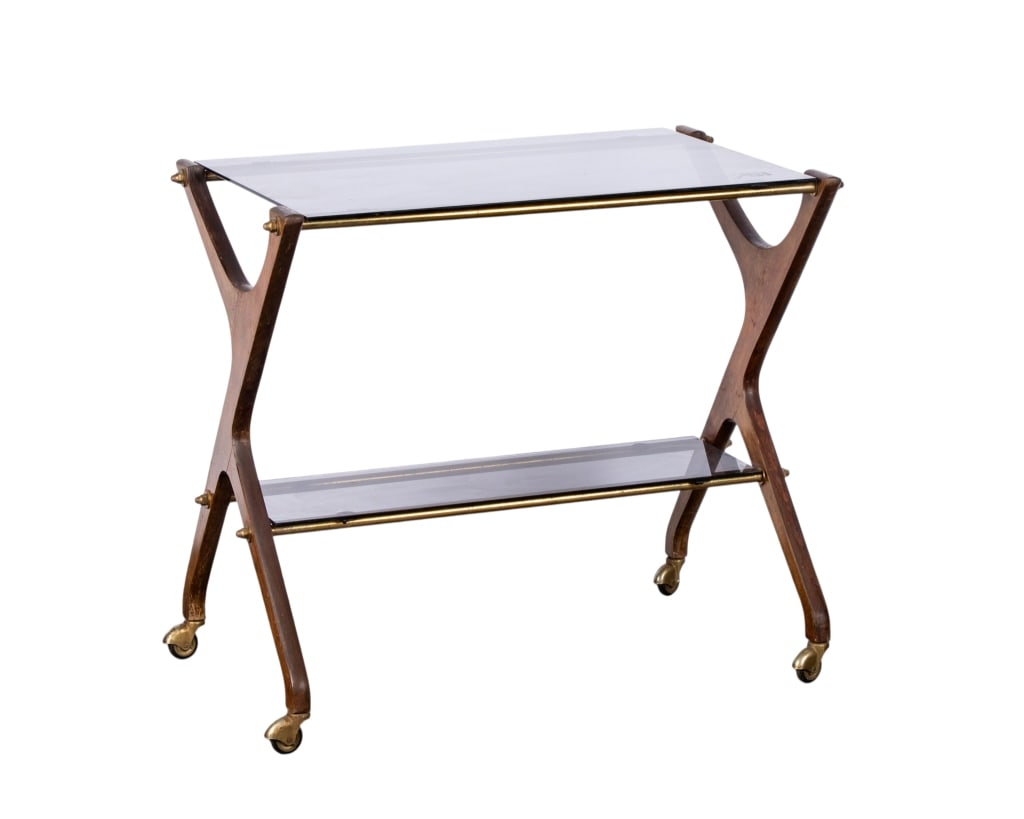 MID-CENTURY SMOKED GLASS & WALNUT BAR CART: Mid-century smoked glass and walnut bar cart. Approximate dimensions: h. 27.5", w. 31", d. 18.5" Disclaimer: Participating bidders must have a credit card on file with LiveAuctioneers in order for the