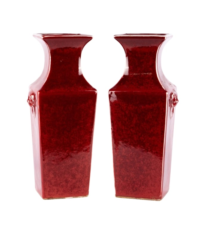 PAIR OF CHINESE OXBLOOD VASES: Pair of Chinese oxblood vases. Approximate dimensions: h. 14.5", w. 6.5", d. 4.75" Disclaimer: Participating bidders must have a credit card on file with LiveAuctioneers in order for their bidding