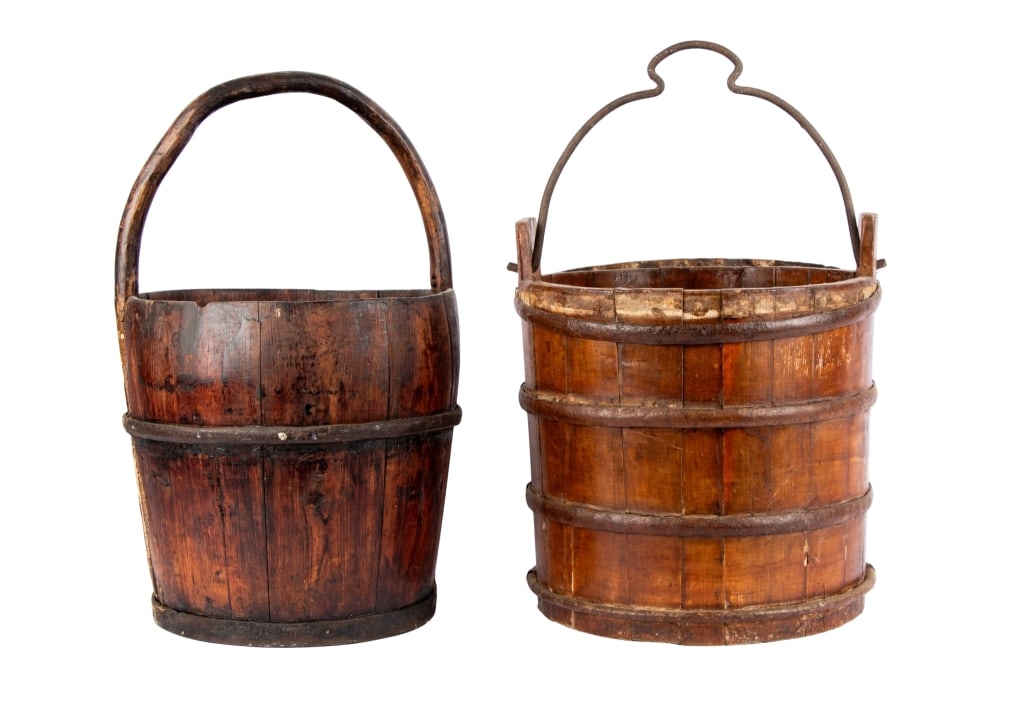 TWO ANTIQUE CHINESE WATER BUCKETS: Two antique Chinese water buckets drilled to be lamps. Approximate dimensions: h. 19", dia. 11.5" Disclaimer: Participating bidders must have a credit card on file with LiveAuctioneers in order for