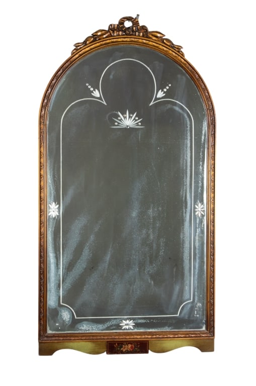 FRENCH LOUIS XVI STYLE MIRROR: French Louis XVI style mirror with etched floral and bow motifs. Approximate dimensions: h. 48.5", w. 25.75", d. 2" Disclaimer: Participating bidders must have a credit card on file with LiveAuctionee