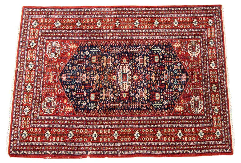 PERSIAN HAND-KNOTTED WOOL RUG: Approximate dimensions: l. 5'6", w. 4'2" Disclaimer: Participating bidders must have a credit card on file with LiveAuctioneers in order for their bidding registration to be approved. Credit cards