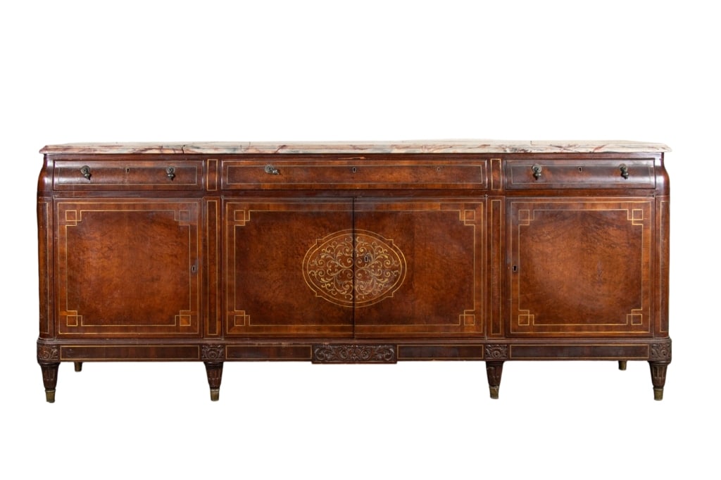 LARGE ITALIAN MARBLE TOP SIDEBOARD: teardrop pulls, carved details to legs, brass inlaid details Approximate dimensions: h. 39", w. 94", d. 23" Disclaimer: Participating bidders must have a credit card on file with LiveAuctioneers in