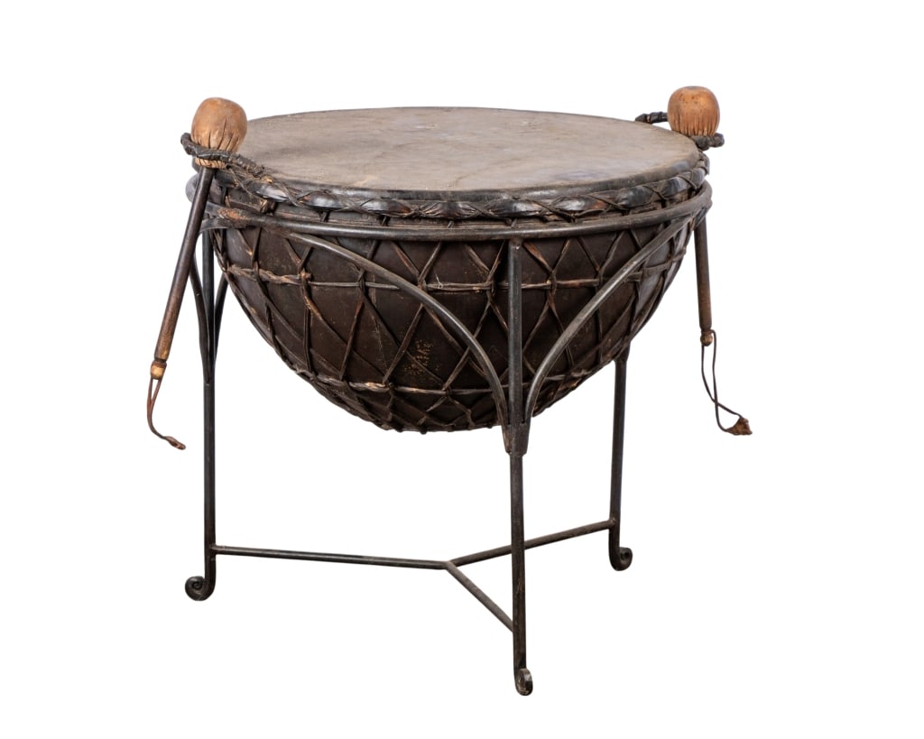 VINTAGE NAGARA DRUM COCKTAIL TABLE: Approximate dimensions: h. 24", dia. 25" Disclaimer: Participating bidders must have a credit card on file with LiveAuctioneers in order for their bidding registration to be approved. Credit cards wil