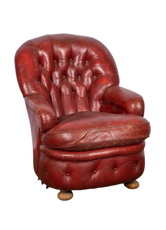 VINTAGE CHESTERFIELD STYLE TUFTED LEATHER ARMCHAIR: Vintage Chesterfield style tufted leather armchair. Approximate dimensions: h. 33", w. 26", d. 24" Disclaimer: Participating bidders must have a credit card on file with LiveAuctioneers in order for
