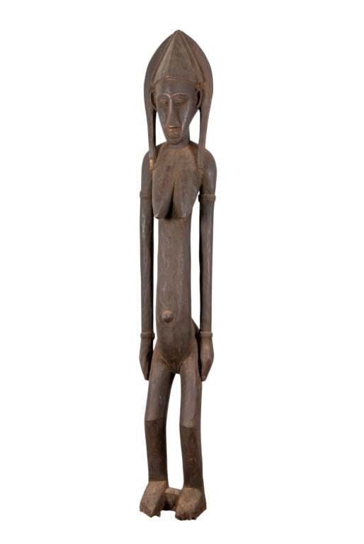 AFRICAN TRIBAL WOOD FEMALE SCULPTURE: African tribal wood female sculpture. Approximate dimensions: h. 60", w. 9", d. 8" Disclaimer: Participating bidders must have a credit card on file with LiveAuctioneers in order for their bidding