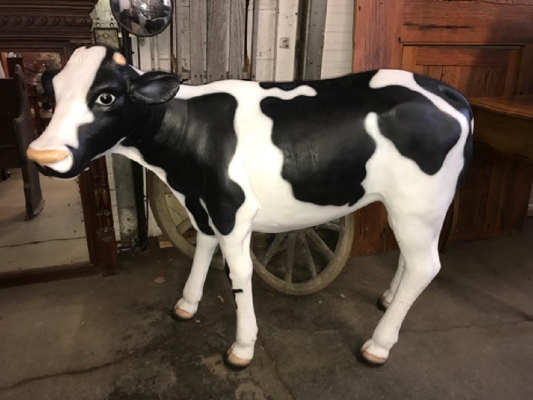 Quality fiberglass cow: Fine quality fierglass cow 39"h x 43"long