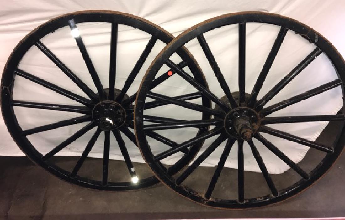 2 ca. 1920 Amish wagon wheels: 2 ca. 1920 Amish wood wagon wheels with steel rims 37" diam.