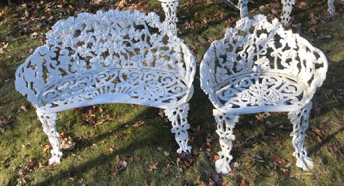 Ca. 1910 2 pc. Cast iron settee and chair: Ca. 1910 2 pc. Cast iron settee and chair settee 37 1/2"h x 26 1/2"w chair 25"h x 21 1/2"w