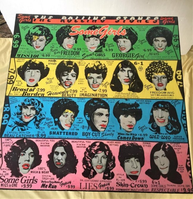 Pop Art painted and decoupaged top table: Unusual and graphic 20th C. Pop Art painted and decoupaged top table on metal pedestal base 28 1/2"h x 24"sq. top.