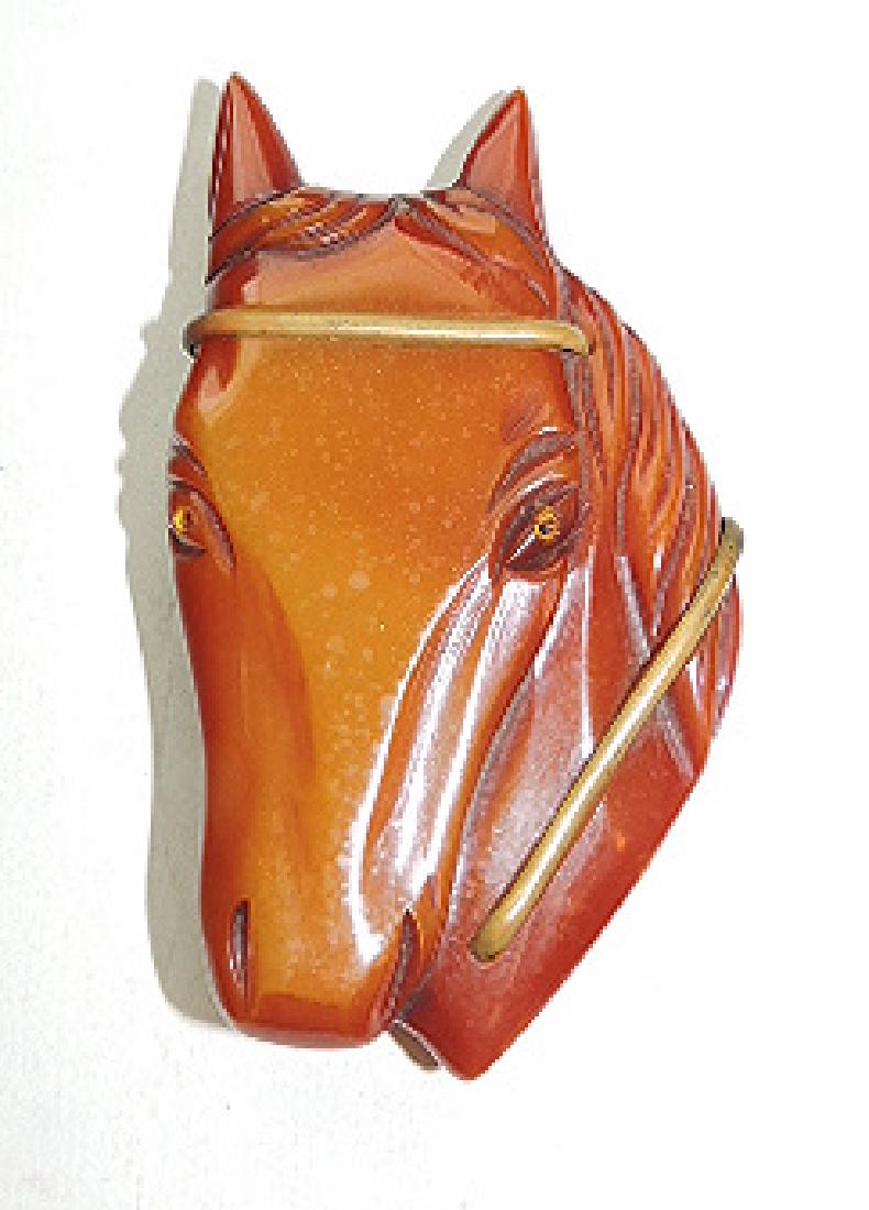 Bakelite butterscotch horse head brooch with brass (1 of 1)