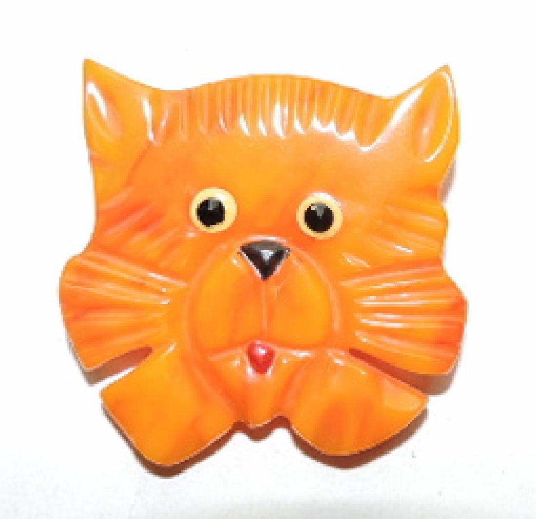 Bakelite cats face brooch (1 of 1)