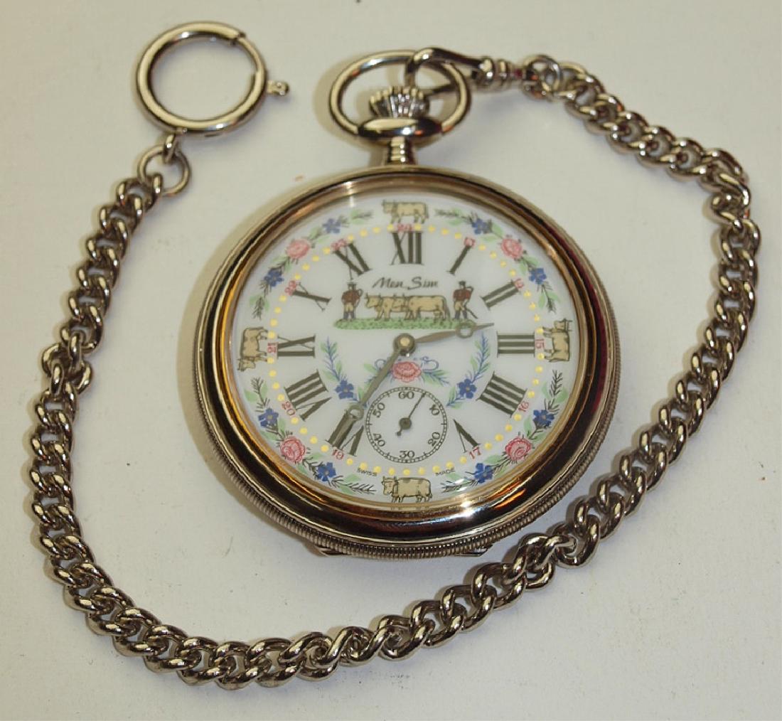 Swiss 17j o.f. pocket watch made by direct decendant of: Swiss 17j o.f. pocket watch made by direct decendant of Menno Simens, scenic dial with farmers and cattle, embossed back with scene of cows feeding in back yard, 16s, with chain, runs