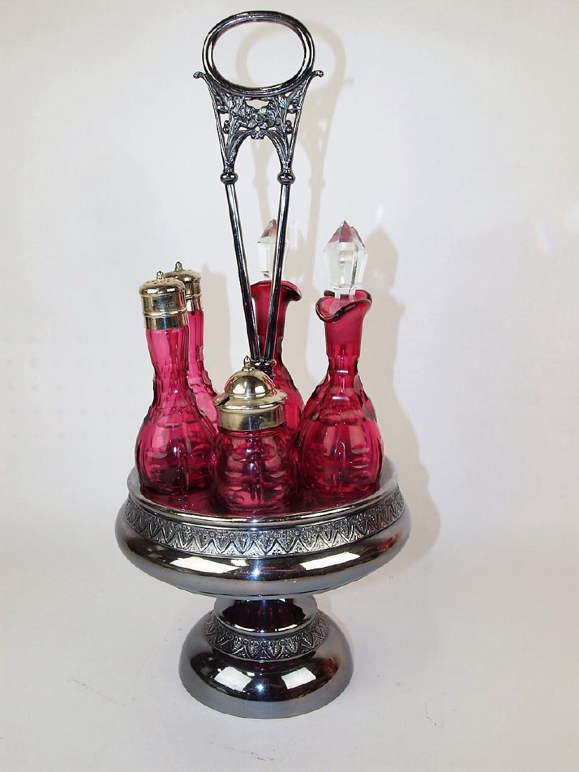 Cranberry 6 bottle castor set in silver plate holder (1 of 1)