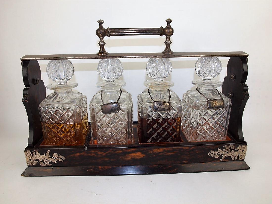 English Tantalus 4 bottle liquor cabinet with silver (1 of 4)