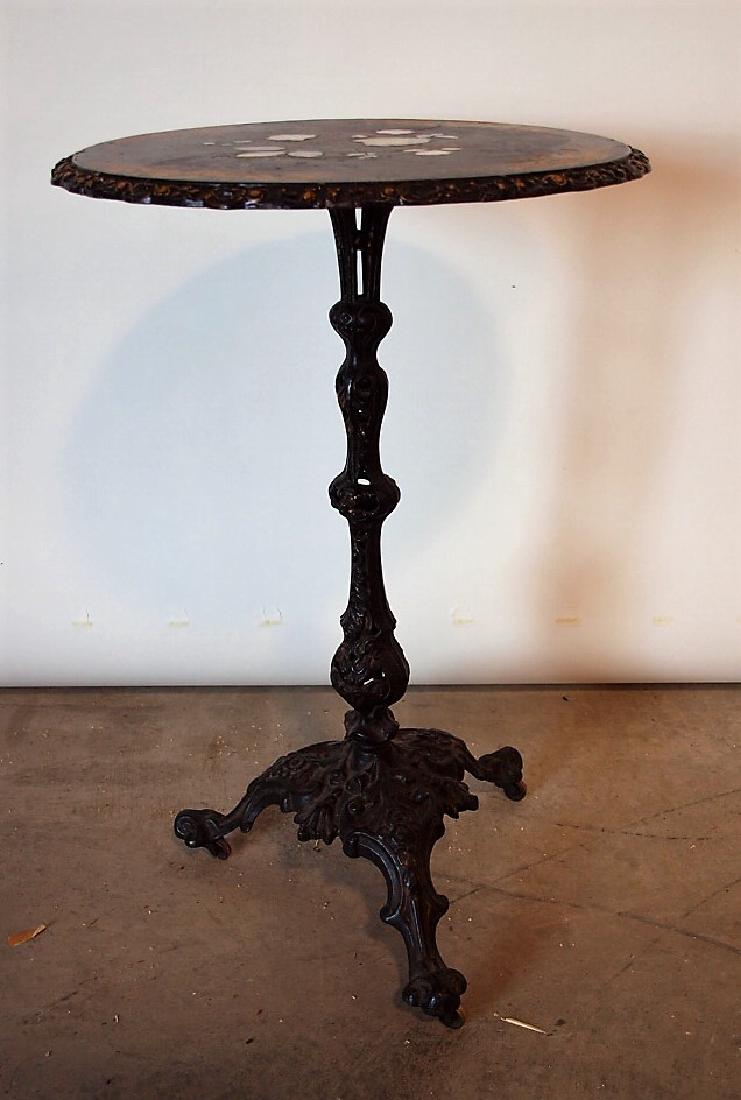 Victorian cast iron tilt top table with MOP inlay on (1 of 2)