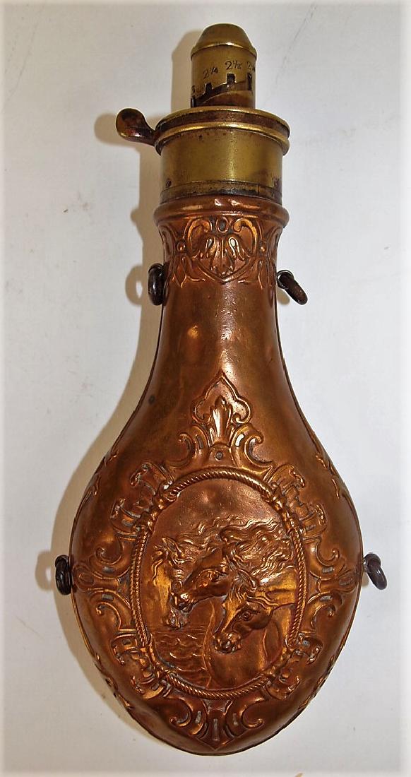 Copper and brass gun powder flask with embossed horses,: Copper and brass gun powder flask with embossed horses, signed G & J W Hawksley, Sheffield, 8"