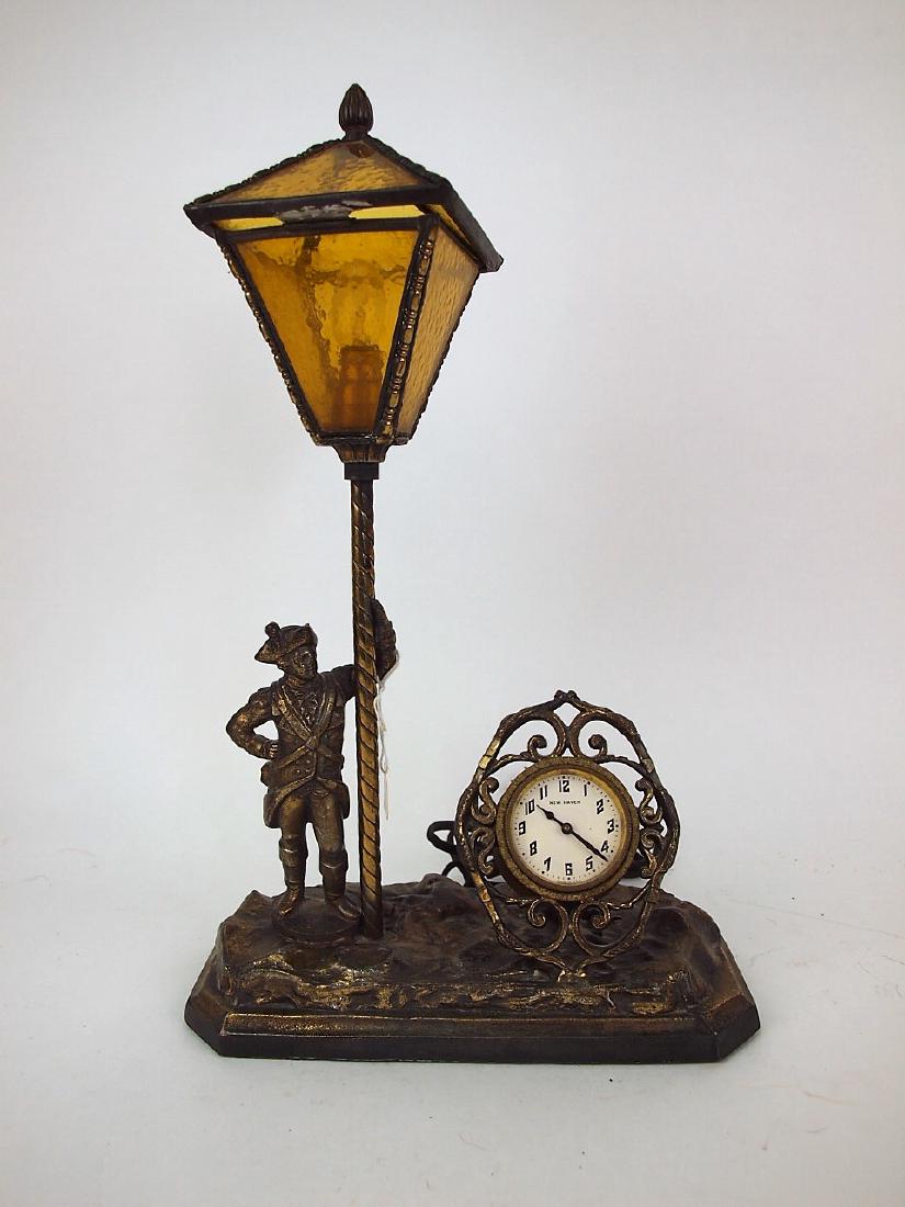New Haven novelty clock of "Minute Man" stand at lamp (1 of 1)
