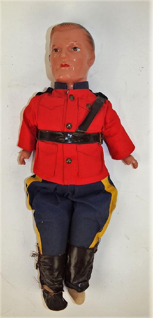 Reliable Canadian Mountie doll in uniform, missing one (1 of 1)