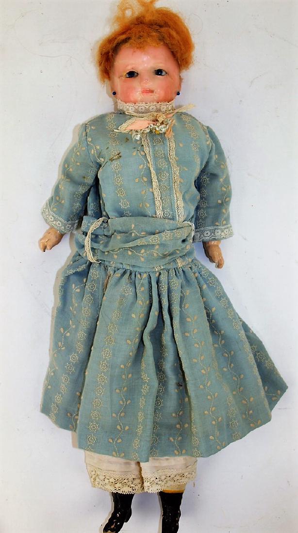 Sweet wax over head doll, circa 1890 composition and: Sweet wax over head doll, circa 1890 composition and half legs, molded boots and earrings