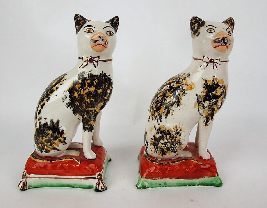 Staffordshire lot of 2 cat figures on cushion, 7 1/2"7 (1 of 1)