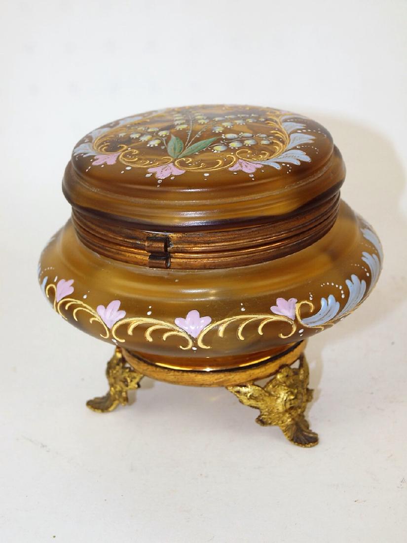 Amber floral enameled dresser jar with brass ormolu, 5: Amber floral enameled dresser jar with brass ormolu, 5 1/2"dormolu, 5 1/2"d