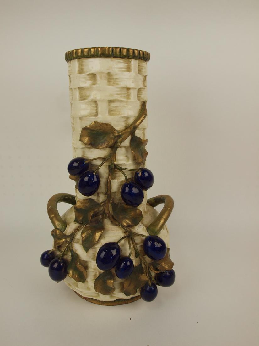 J.S. Amphora style pottery vase with fruit, base nick, (1 of 1)