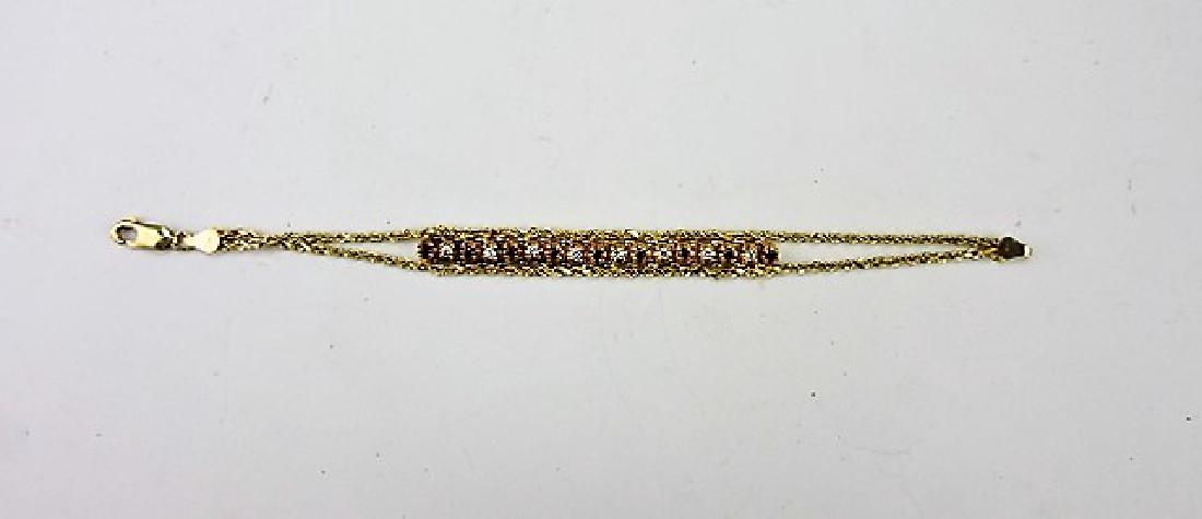 14kt yg diamond and ruby bracelet, 15.9g (1 of 1)