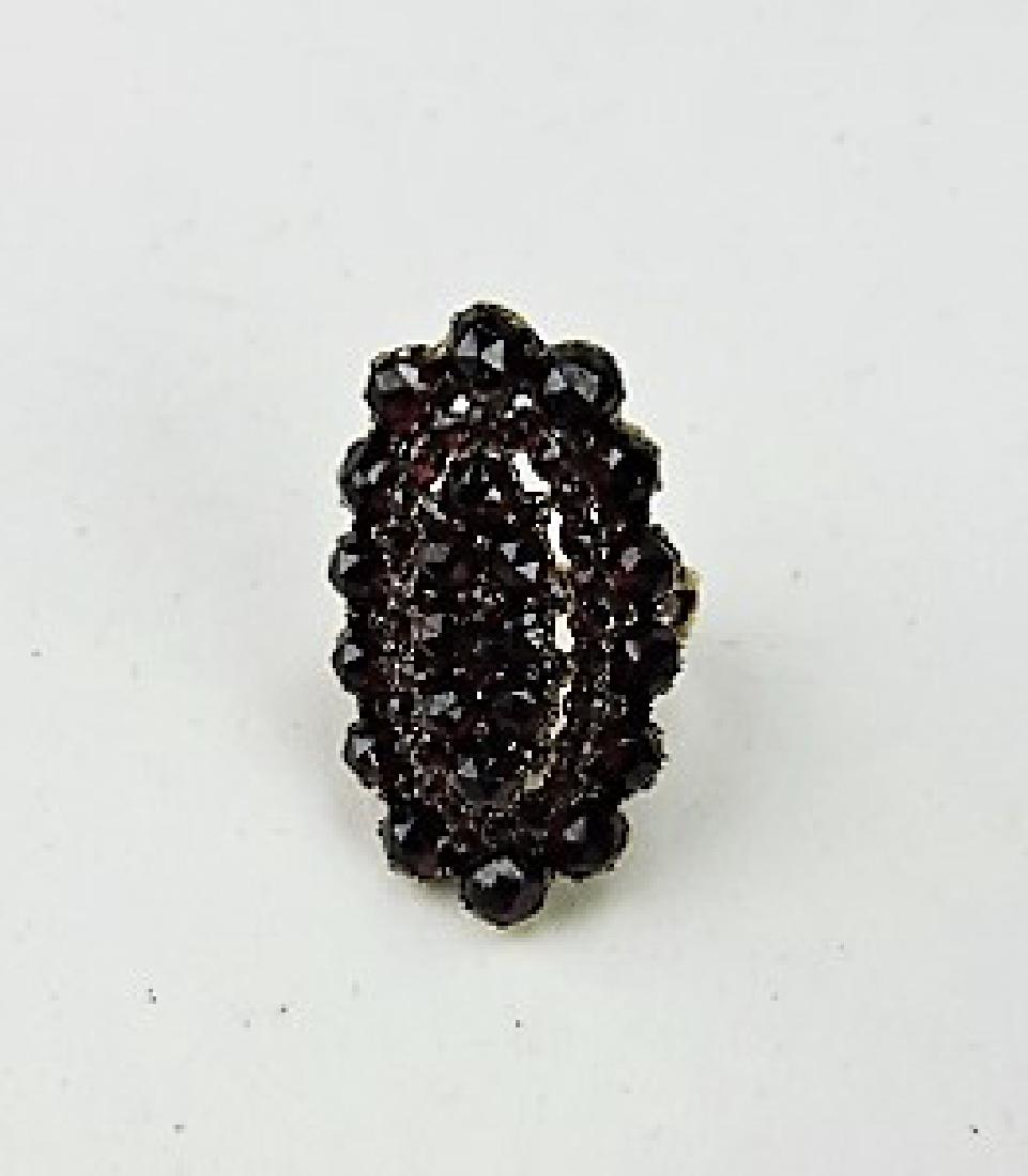 Gold filled and garnet lady's ring: .