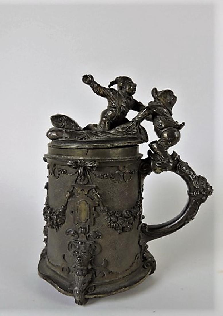 German bronze sculpted stein, 19th C, hinged lid with (1 of 2)