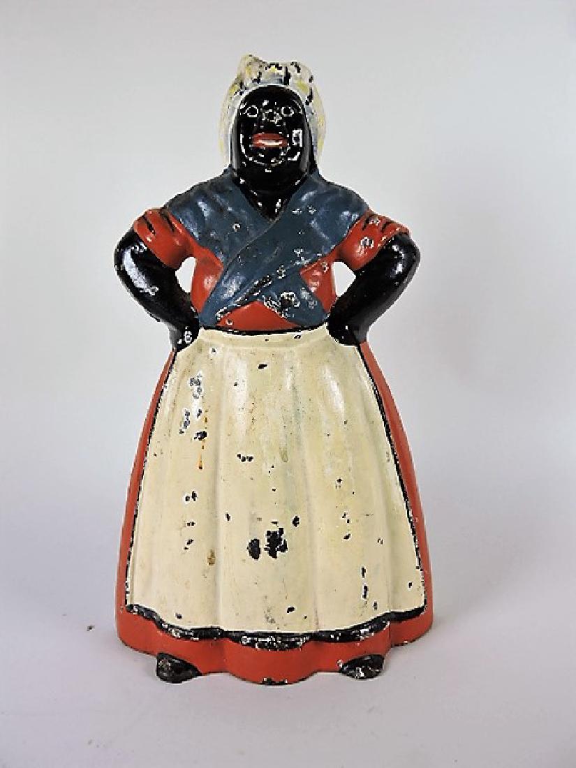 Cast iron Black Mommy doorstop, hairline, 13 1/2": .