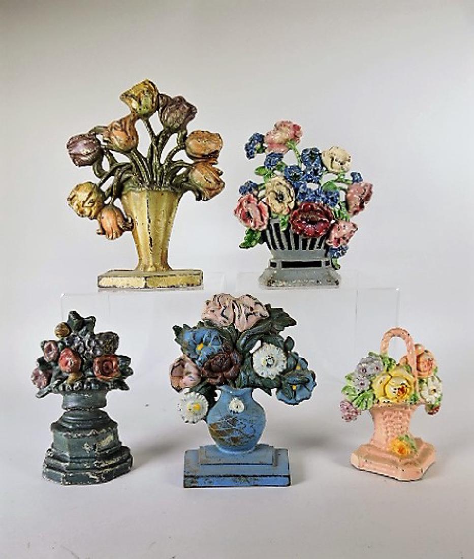 Cast iron lot of 5 flower doorstops (1 of 1)