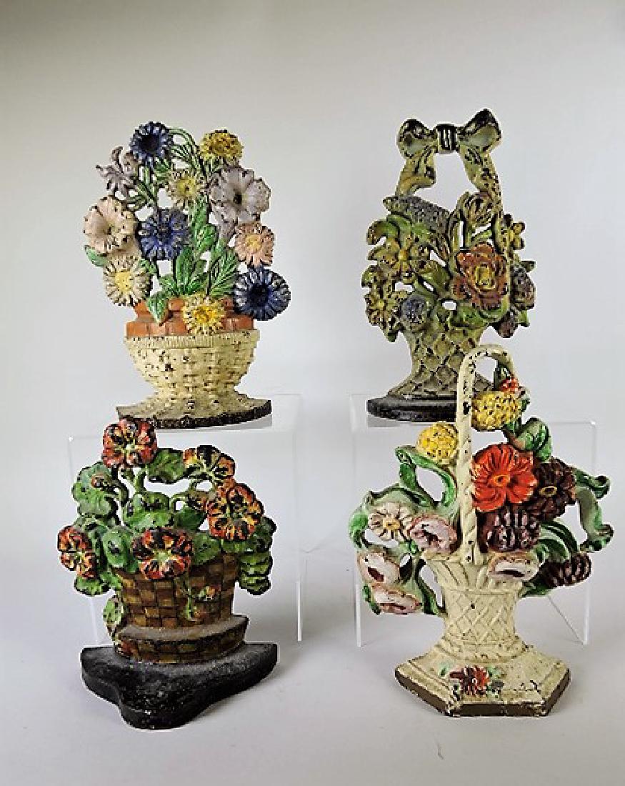 Cast iron lot of 4 flower doorstops (1 of 1)