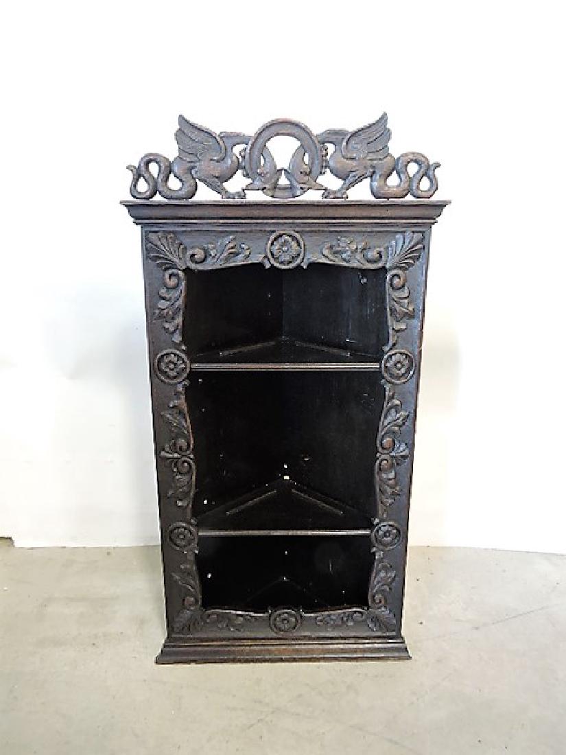 Black Forest carved corner shelf with carved front and (1 of 2)