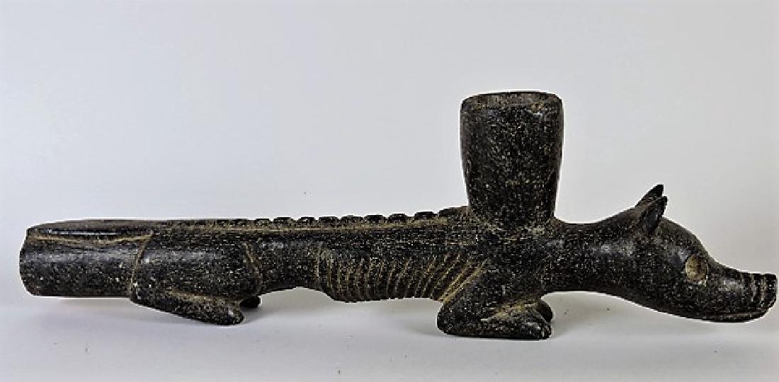 Indian artifact figural pipe replica with tag, "Butler (1 of 2)