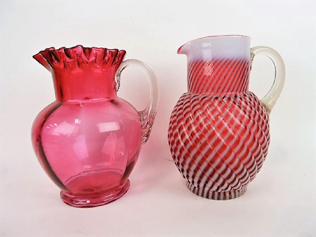 Cranberry water pitcher with clear ribbed handle (1 of 1)