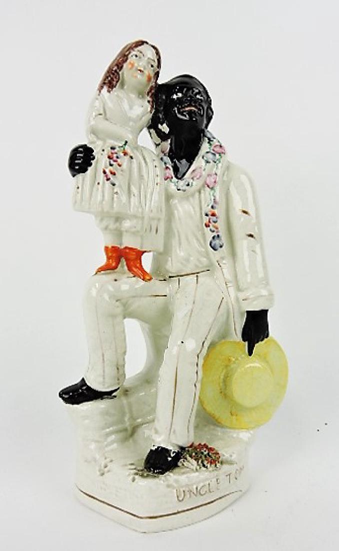 Staffordshire figure of Uncle Tom with Eva, 11" (1 of 1)