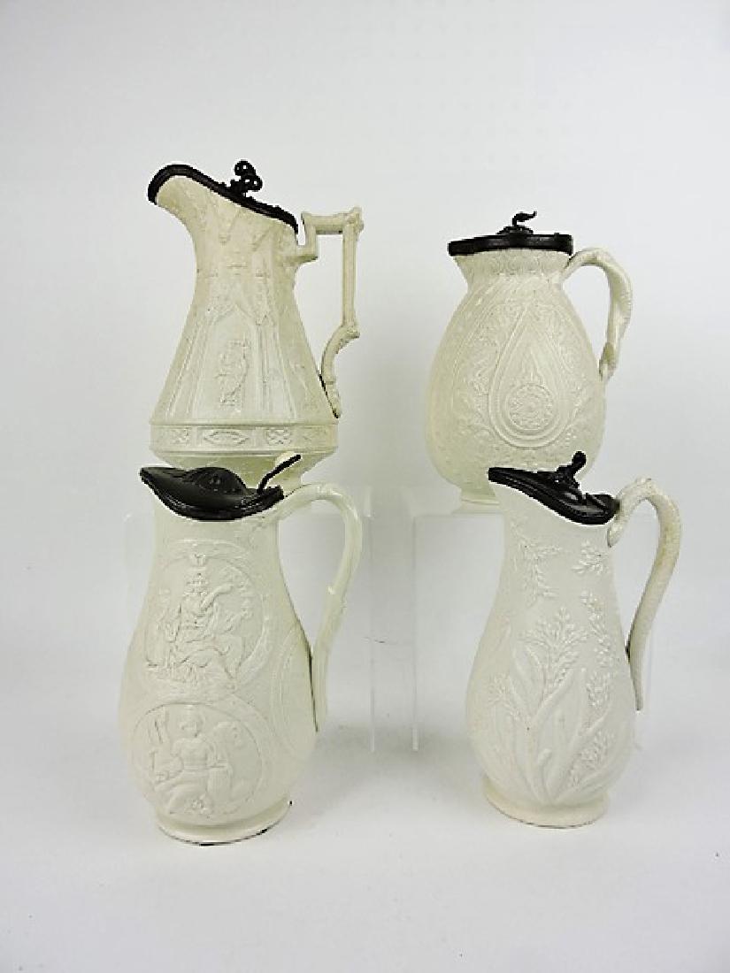 Parian lot of 4 molded jugs with pewter tops (1 of 1)