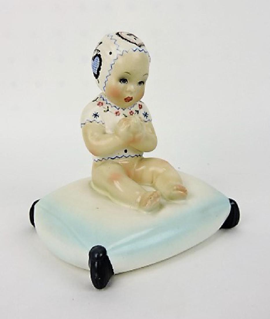 Lenci Torino figure of child on cushion, 3 3/4" (1 of 2)