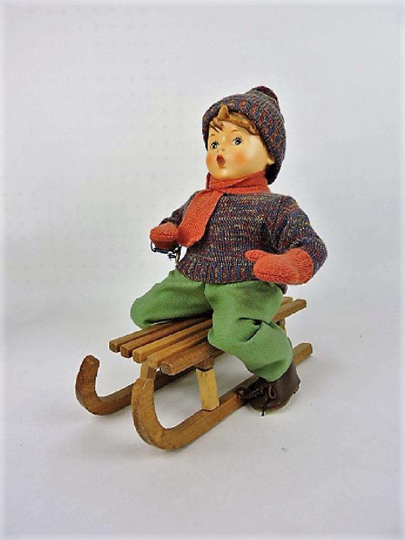 Hummel boy on sled (1 of 1)