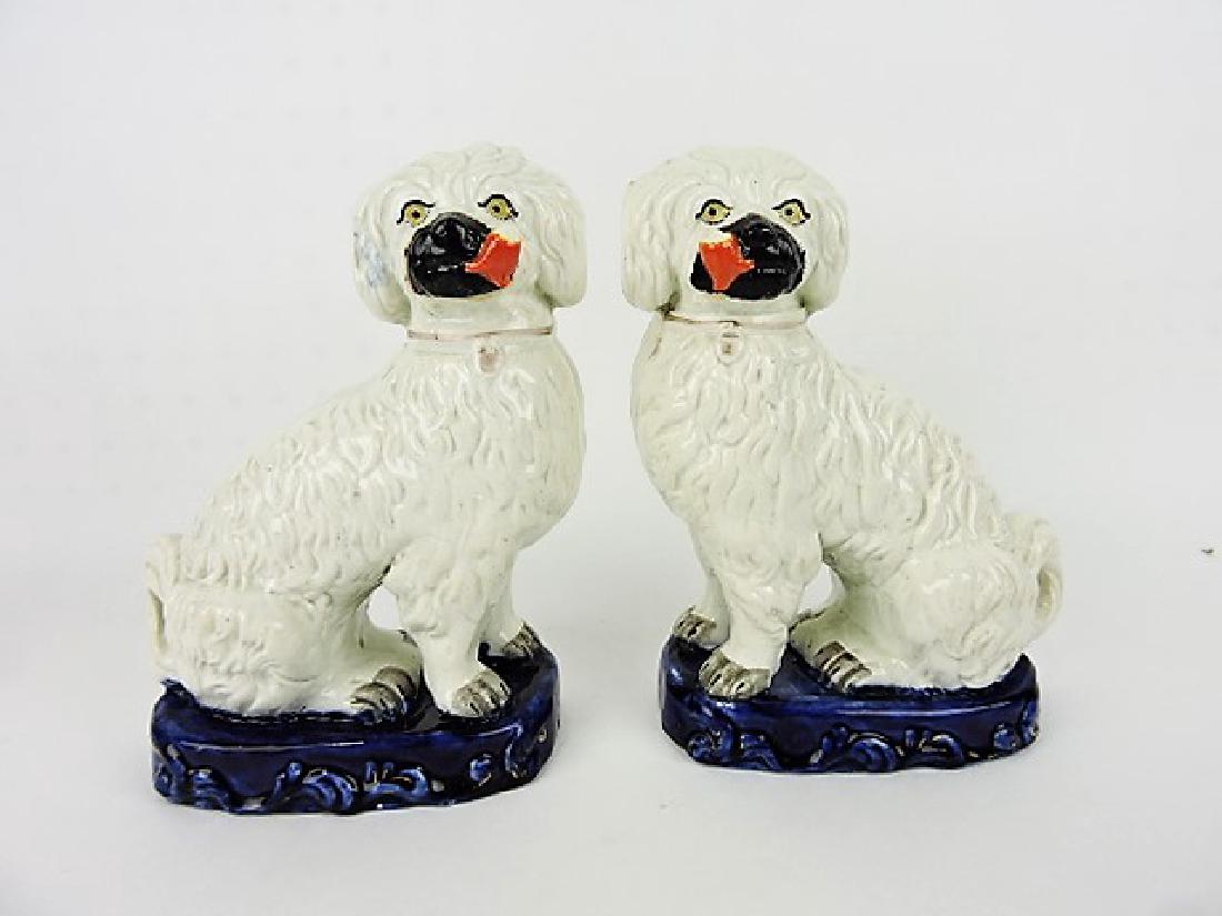 Staffordshire pair of smoking spaniels on blue (1 of 3)