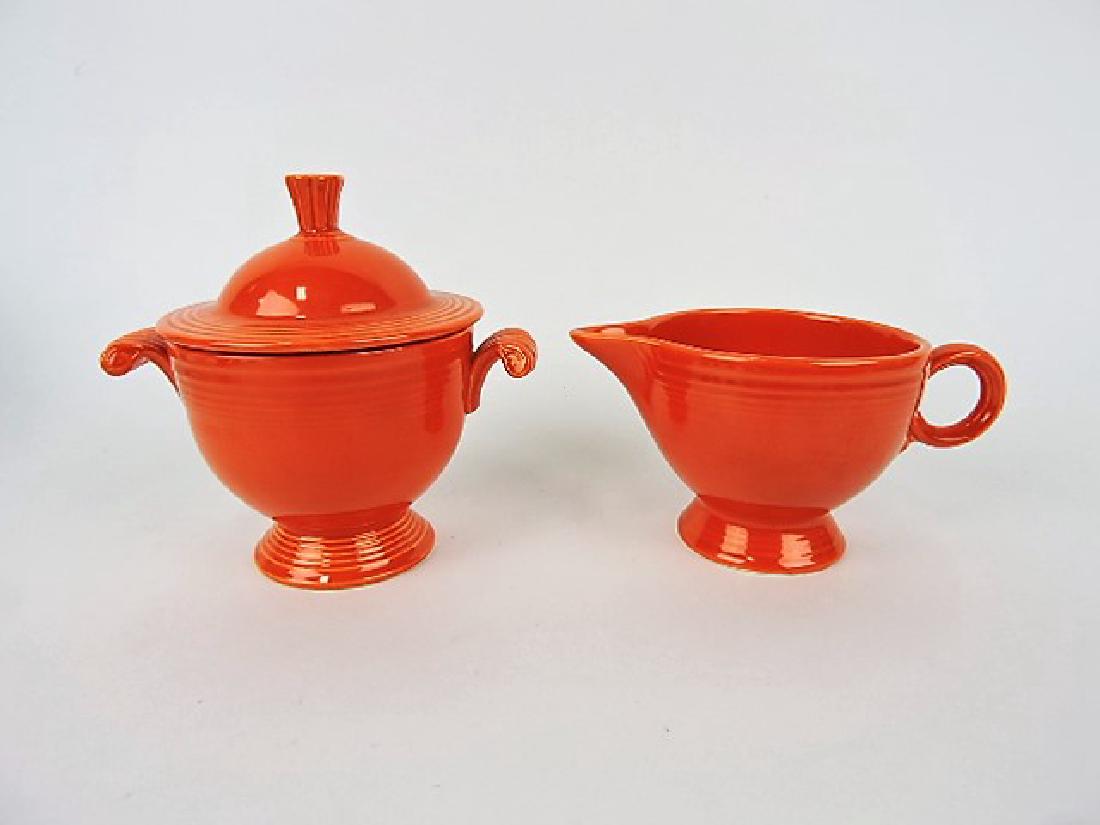 Fiesta cream and sugar, red, nick to finial: .