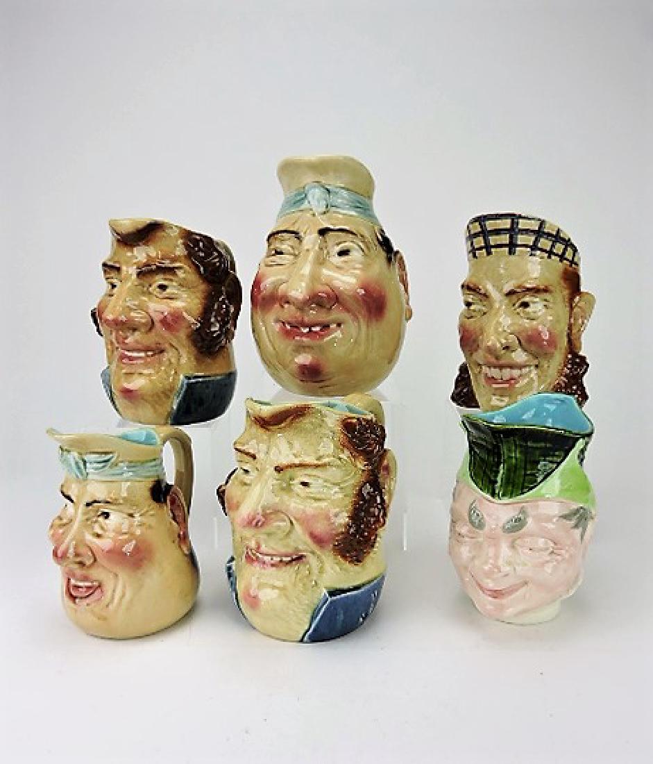 Sarreguemines majolica lot of 6 face jugs, various: condition