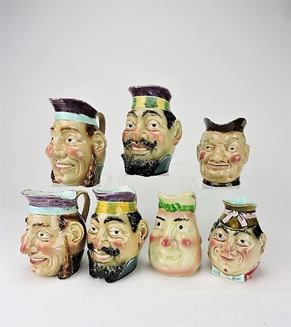 Majolica lot of 7 face jugs, various condition (1 of 1)