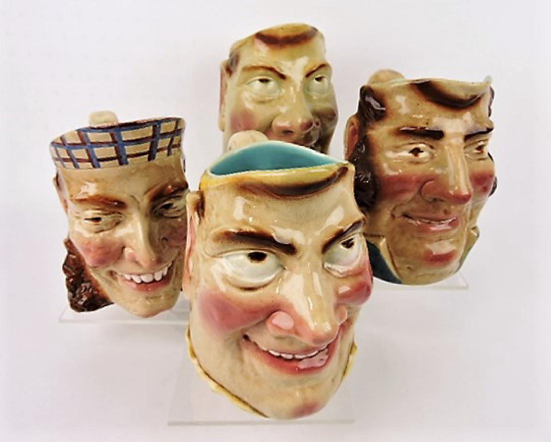 Sarreguemines majolica lot of 4 face jugs, various: condition