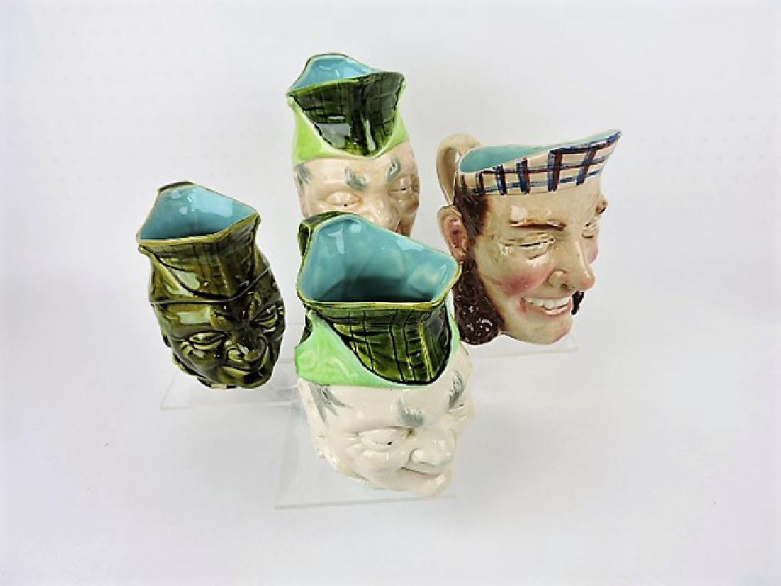 Sarreguemines majolica lot of 4 face jugs, various: condition