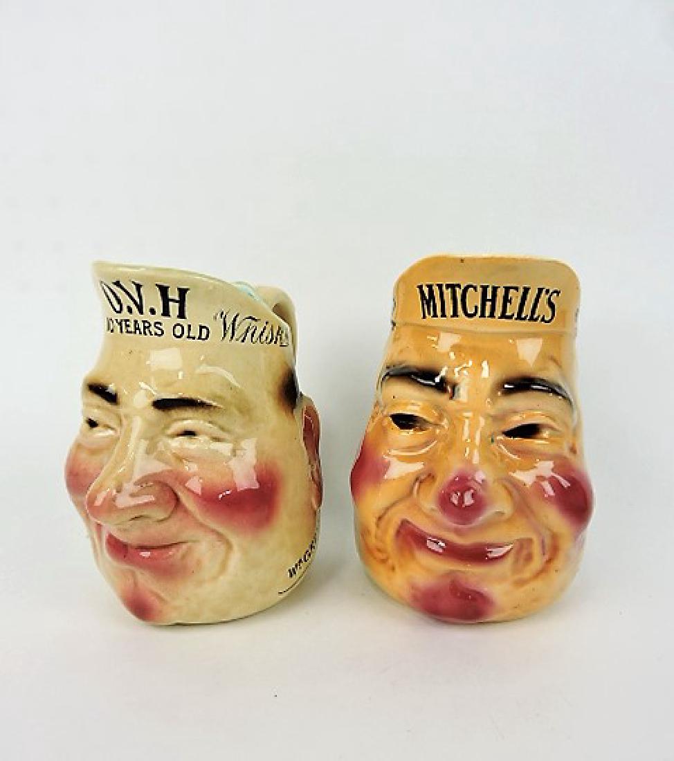 Majolica lot of 2 advertising face jugs (1 of 1)