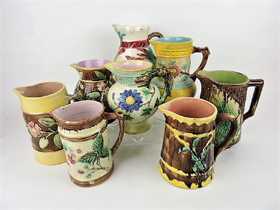Majolica lot of 8 pitchers, various condition: .