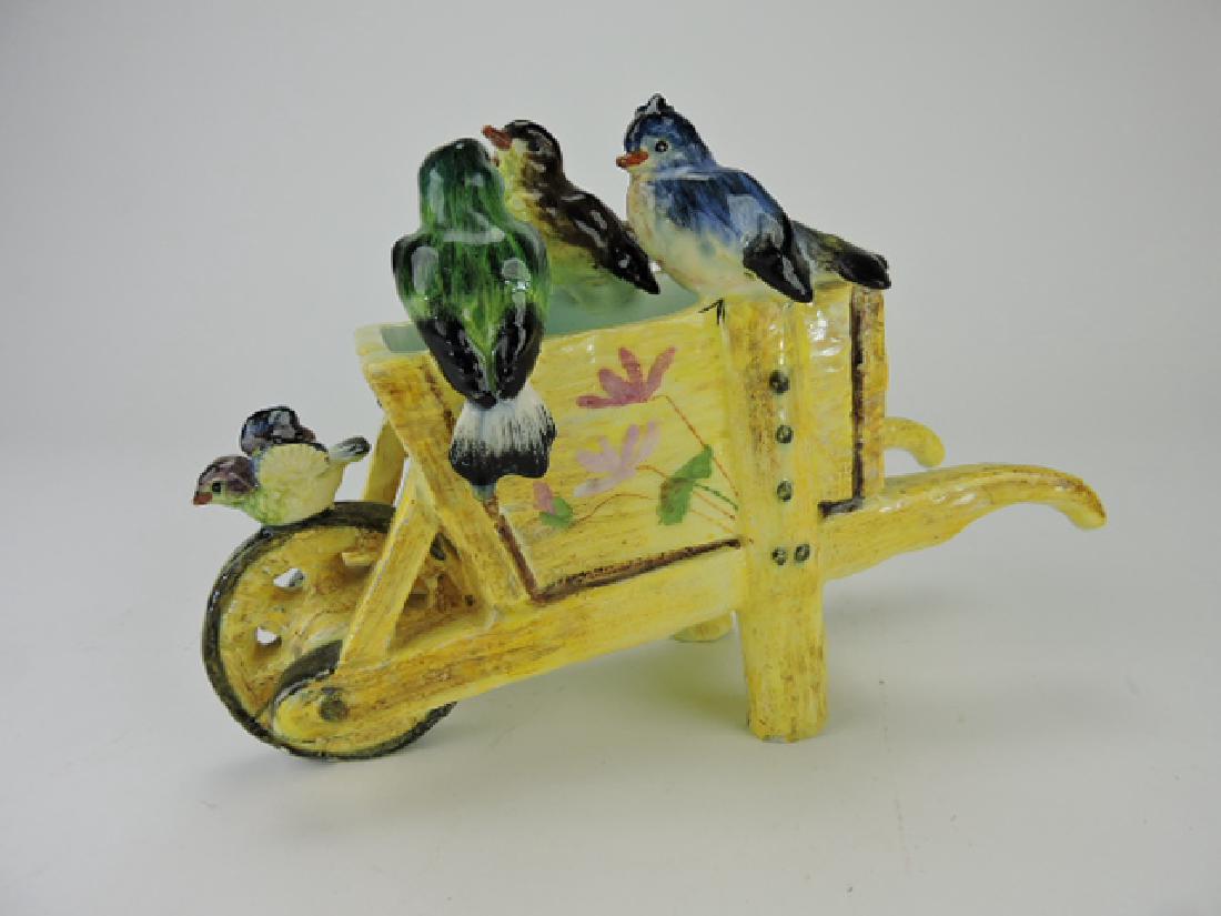 Jerome Massier majolica wheel barrow with: birds perched on edge, 11"